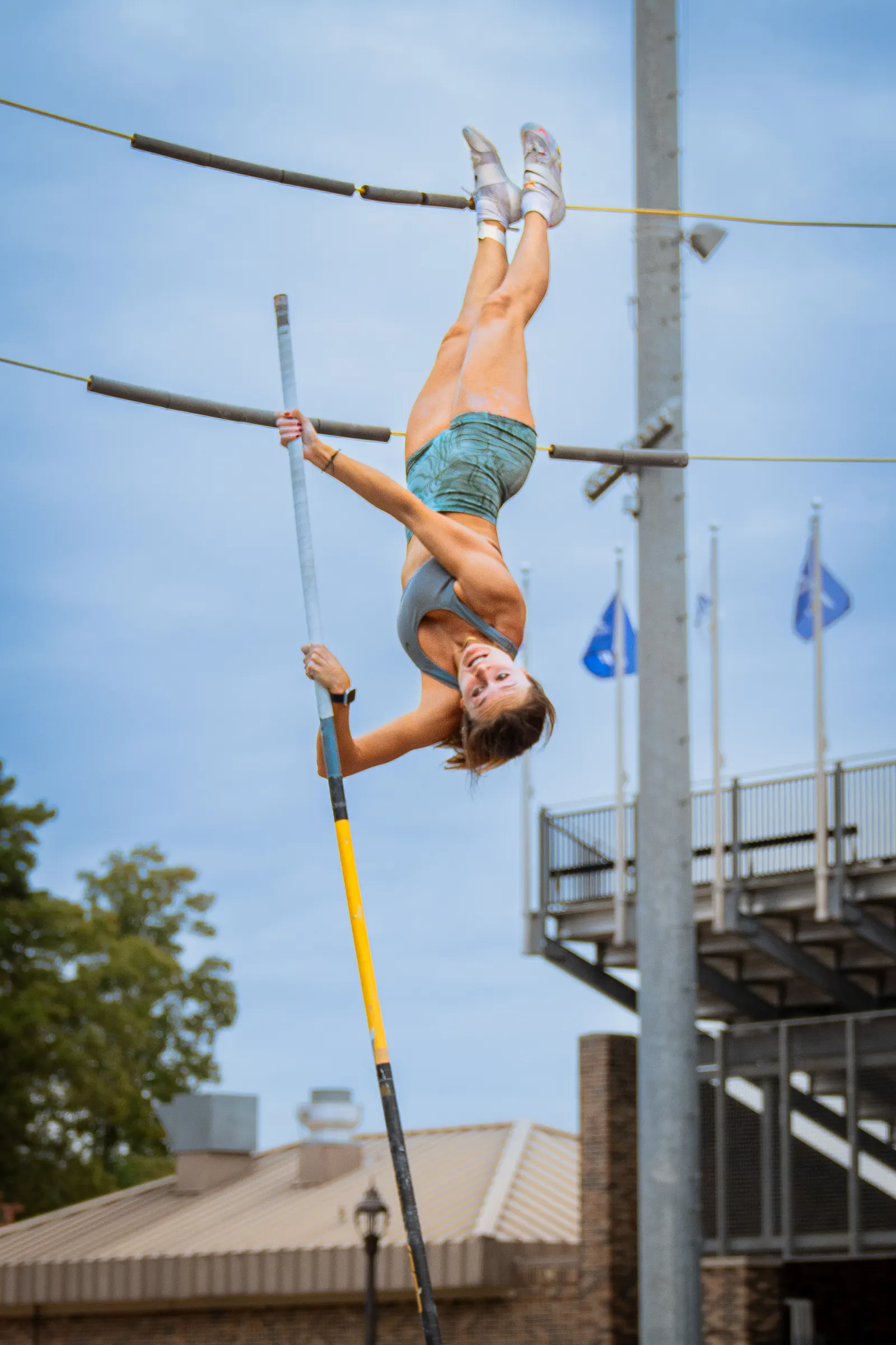 Pole vaulter upside down over the bar